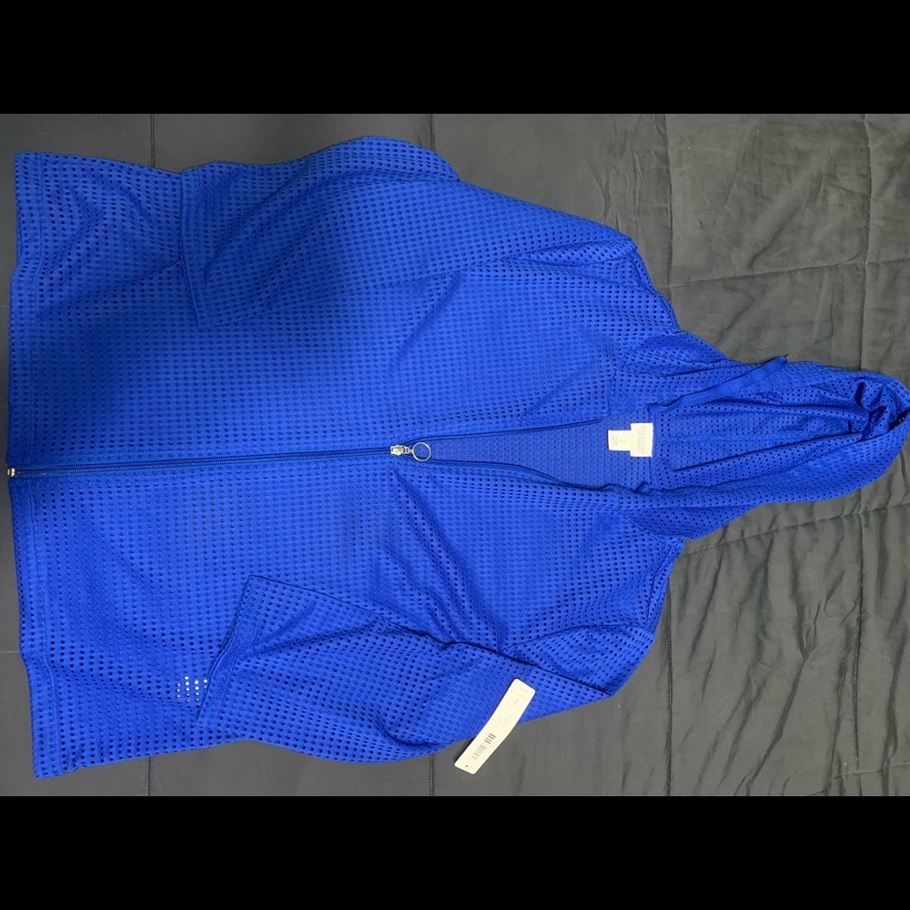 Chicos jacket brand new with tags. Size 2 in Chicos